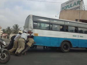 Police having to push bus on KH Road flyover, Bangalore