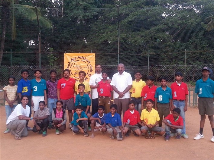 Dilip Kudwalli standing in the centre with kids from Surabhi Foundation and Sheetal sitting on the extreme left.